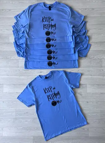 In Sam's name "Keep on Keeping on" Blue T-shirt